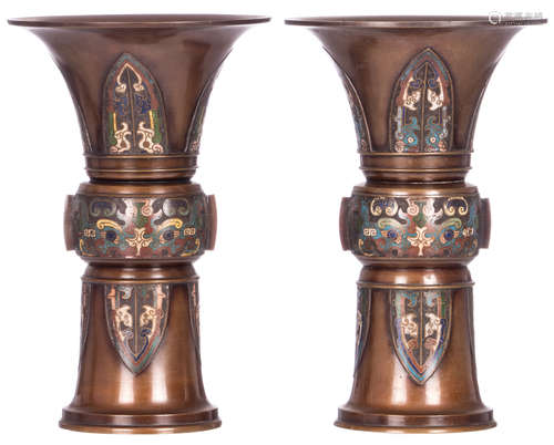 A pair of archaic Chinese bronze Gu vases, champlevé decorated, about 1900, H 36 cm