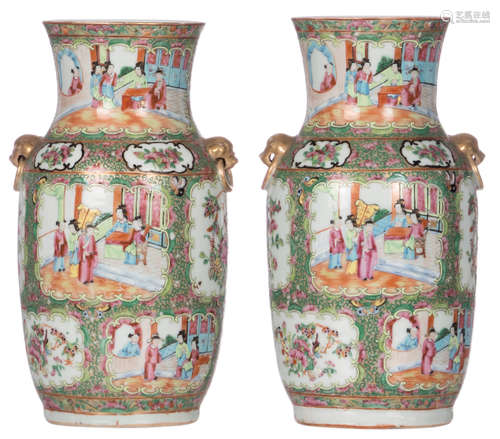 A pair of Chinese Canton famille rose vases, floral decorated, the roundels with court scenes, H 35,5 cm