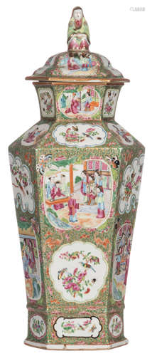 A Chinese Canton decorated hexagonal vase and cover, with in de roundels court scenes and fauna and floral decors, 19thC, H 64 cm