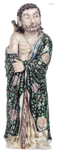 A Chinese polychrome decorated statue decorated in the famille verte way, H 23,5 cm