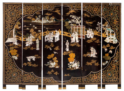 A Chinese six panel screen, polychrome lacquered and with ivory, precious stones and mother of pearl inlay depicting an animated garden scene with birds and flower branches, H 182 - W 252 cm