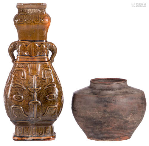 A Chinese red earthenware jar of the Ban Chiang type; added a Chinese archaic green glazed earthenware vase, H 12 - 28 cm