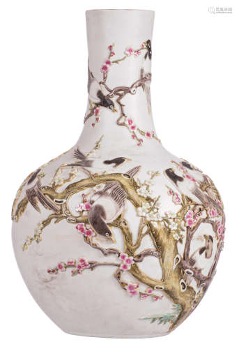 A Chinese famille rose bottle vase, relief decorated with birds on flower branches, with a Qianlong mark, H 55,5 cm