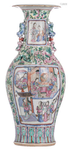 A Chinese famille rose floral decorated baluster shaped vase, the roundels with court scenes and figures, relief decorated, 19thC, H 62,5 cm