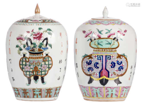 Two Chinese famille rose ginger jars, decorated with a flower vase and a flower basket, and calligraphic texts, H 32 - 32,5 cm
