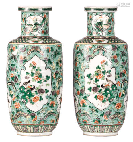 A pair of Chinese famille verte vases, decorated with flowers, cranes and the symbollically pierced rocks, 19thC, H 45 cm