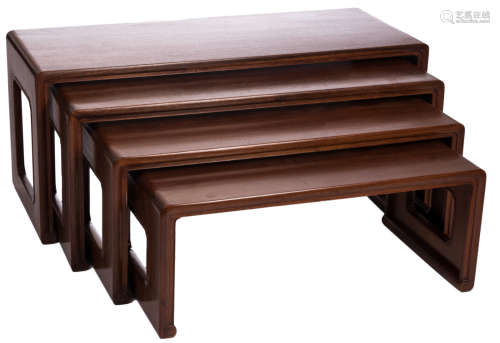 A Chinese four-piece set of hardwood nest tables, H 47 - W 110 - D 42 cm