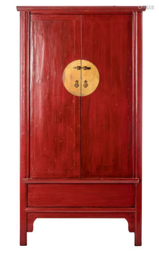 A Chinese red lacquer cabinet, the doors with a circular brass mount, H 195 - W 102 - D 65 cm