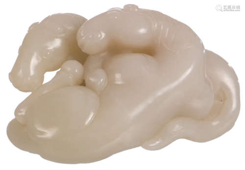 A Chinese jade carved group, depicting two horses, Qing dynasty, H 6 - W 11 cm