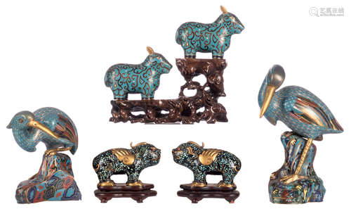 Three pairs of Chinese cloisonné enamel figures depicting animals, one pair on a wooden stand; added a Chinese sculptured hardwood soccle, H 7 - 22 cm