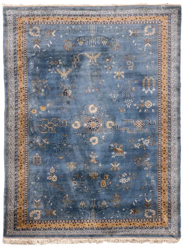 A Chinese rug, decorated with floral motives and a meandering frieze, wool on cotton, 263 x 341,5 cm