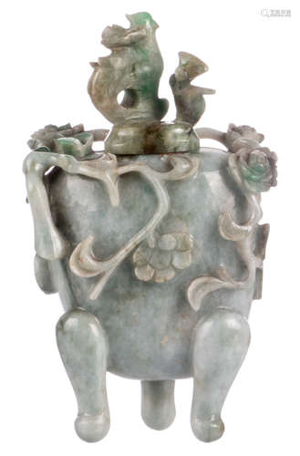 A Chinese jade vase and cover decorated with flower branches and a bird, H 12,5 cm