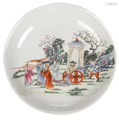 A Chinese famille rose decorated plate with an animated scene, with a Qianlong mark, 19thC, ø 40 cm