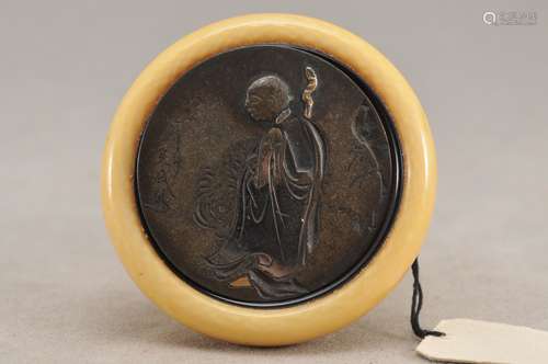 Kagamibuta Netsuke. Japan. 19th century. Mixed metal