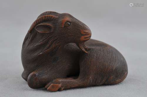 Carved wood Netsuke. Japan. 19th century. Study of a