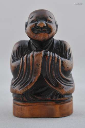 Seal Netsuke. Japan. 19th century. Carved wood. Seated