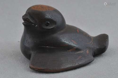 Wooden Netsuke. Japan. 19th century. Study of a bird.