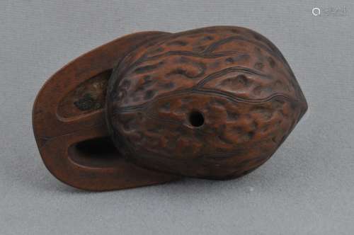 Carved wood Netsuke. Japan. 19th century. Study of a