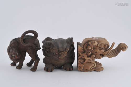Lot of three wood carvings. Japan. 19th century. A