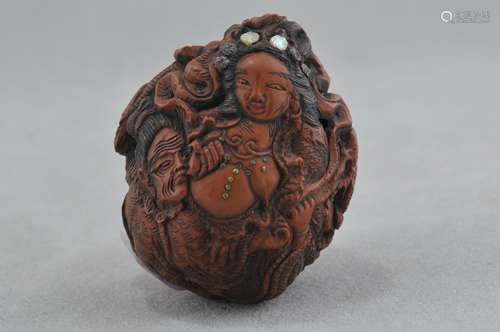 Carved walnut shell Netsuke. Japan. 19th  century.