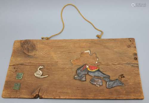 Wooden plaque. Japan. 19th century. Pottery inlay of a