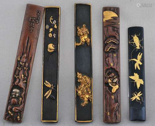 Five Kodzuka hilts. Japan. 19th century. Mixed metal