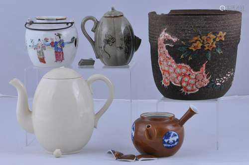 Lot of five assorted ceramics. Four teapots and a