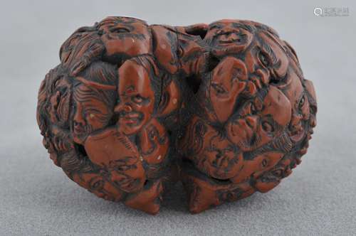 Carved walnut shell Netsuke. Japan. 19th century.