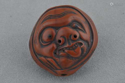 Carved wooden Netsuke. Japan. 19th century. Comic mask