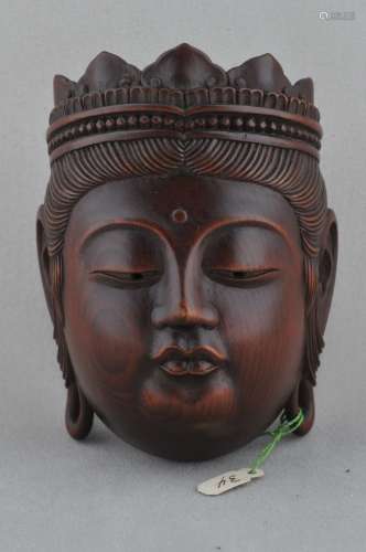 Carved wooden Netsuke. Japan. 19th century. Mask in the