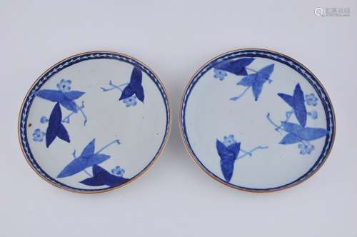 Two Arita porcelain plates. Japan. Early 20th century.