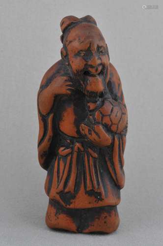 Carved wooden Netsuke. Japan. 19th century. Standing