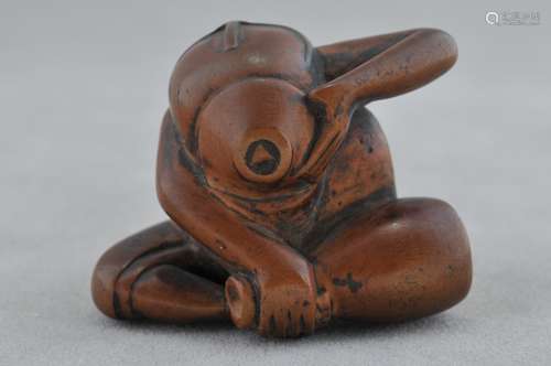 Carved wooden Netsuke. Japan. 19th century. Study of a