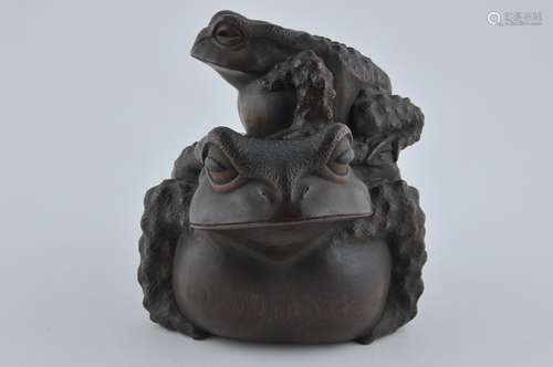 Wood carving. Meiji period. Carving of two frogs.