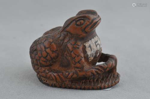 Carved wooden Netsuke. Japan. 19th century. Study of a