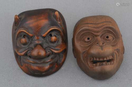 Lot of two wooden Netsuke. Japan. 19th century. Masks