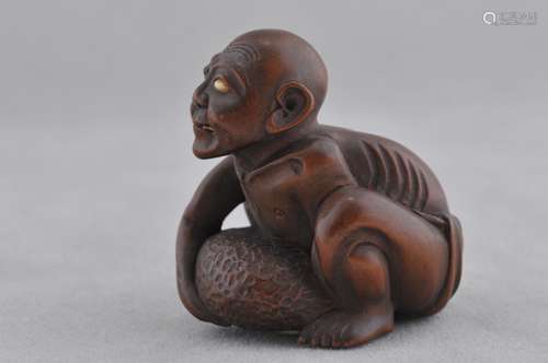 Wooden Netsuke. Japan. 19th century. Carved figure of a