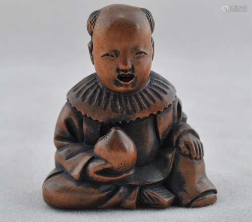 Carved wooden Netsuke. Japan. 19th century. Small boy