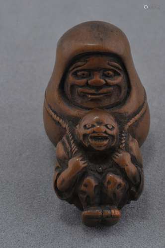 Carved wooden Netsuke. Japan. 19th century. Figure of a