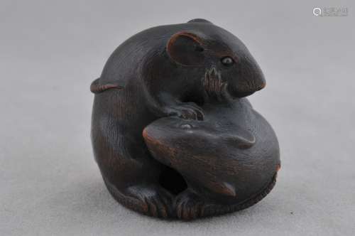 Wooden Netsuke. Japan. 19th century. Study of a pair of