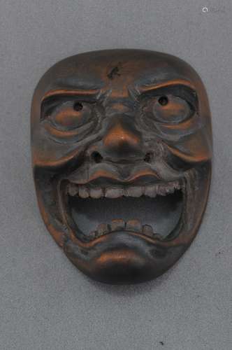 Carved wooden Netsuke.Japan.  Mask. 19th century. 2