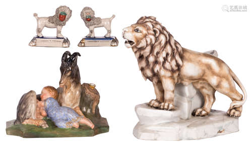 A polychrome decorated biscuit jardinière in the shape of a lion standing in a landscape, 19thC; added a pair of ornamental dogs of the Stafford type; extra added an ornamental vase in the shape of a goat and a child in a landscape, H 8,5 - 25 cm