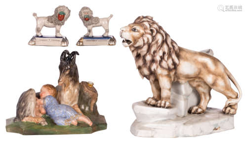 A polychrome decorated biscuit jardinière in the shape of a lion standing in a landscape, 19thC; added a pair of ornamental dogs of the Stafford type; extra added an ornamental vase in the shape of a goat and a child in a landscape, H 8,5 - 25 cm