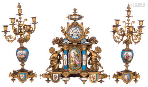 A Neoclassical gilt bronze three-piece garniture with polychrome decorated porcelain constructive parts of the Sèvres type, the dial marked 'H. Luppens à Bruxelles', H 58,5 cm