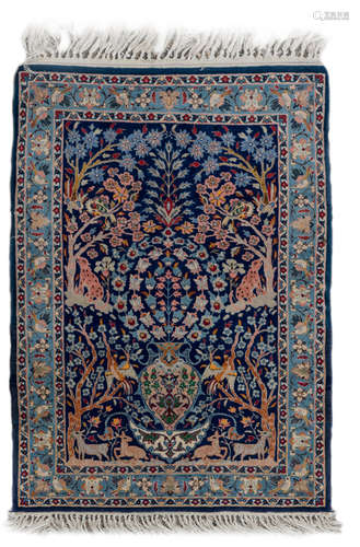 An Oriental rug floral decorated with animals, Isfahan, wool on cotton, 66 x 95 cm