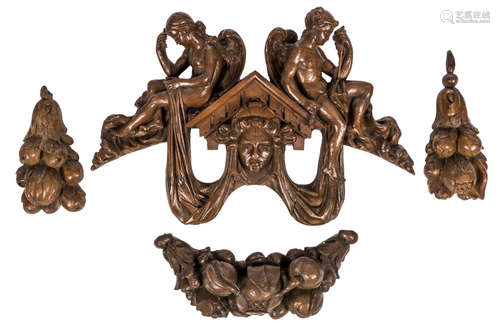 An architectural sculpted wooden Renaissance style fragments; added two ditto baroque pendants and a fruit branch, 17thC, H 35 - 58 cm