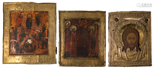 Three Eastern European icons with a silver riza, 19thC, 22,5 x 29 - 24 x 29 - 27 x 32 cm