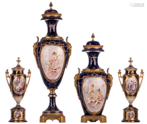 A bleu royal ground Sèvres vase, the roundels decorated with a romantic scene signed Rochette, with bronze mounts and a Sèvres mark; added the pendant of the previous vase, seriously damaged; extra added two ditto decorative vases with a Vienna mark, H 43 - 80 cm