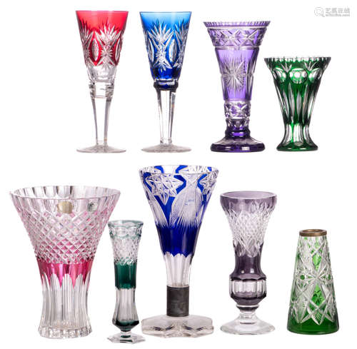 Nine cut crystal vases, H 31 cm