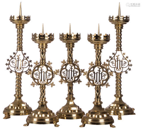 Set of five brass Gothic Revival church candelabras, H 61 - 74,5 cm